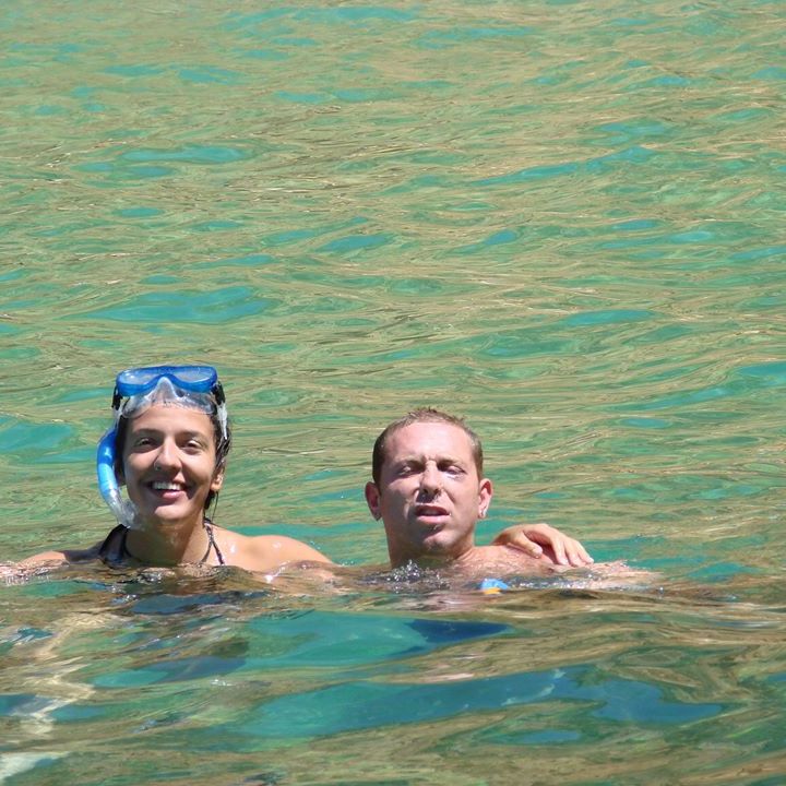 two people swimming