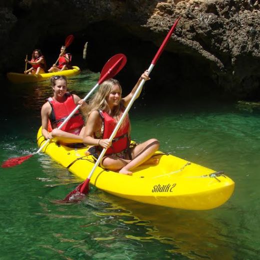 two girls on a kayak
