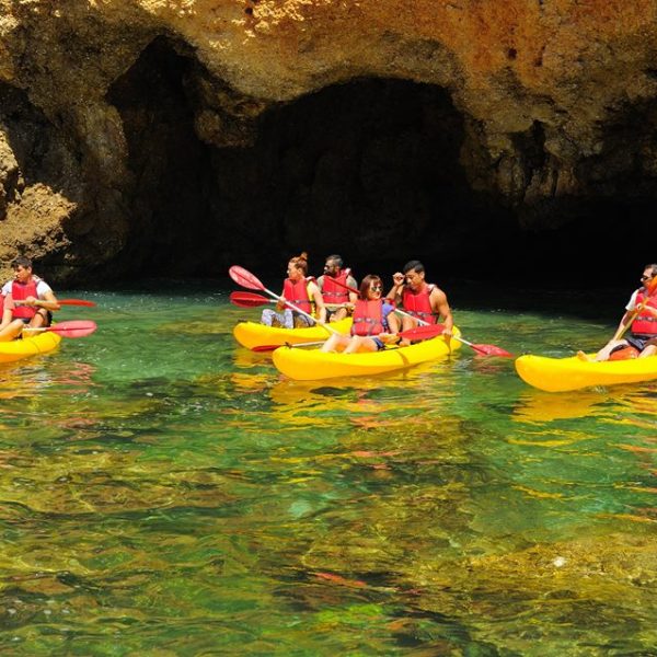 people having some rest on their kayaks