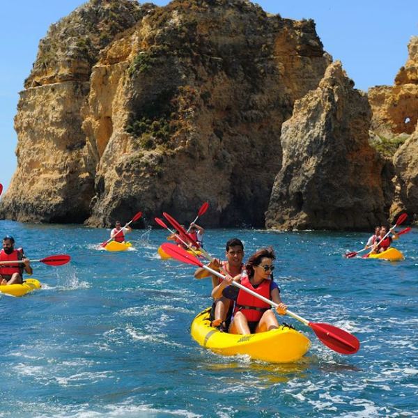 Lagos Beach and people kayaking